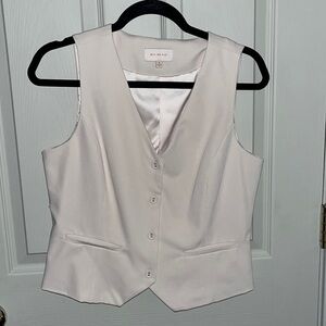 Skies are blue cream vest